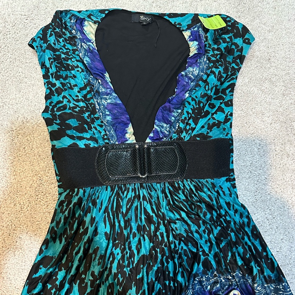 Sky brand flowy top with embellishments on the front